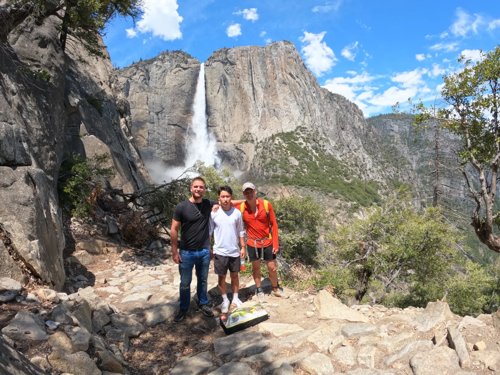Logan and two friends below Yosemite Falls