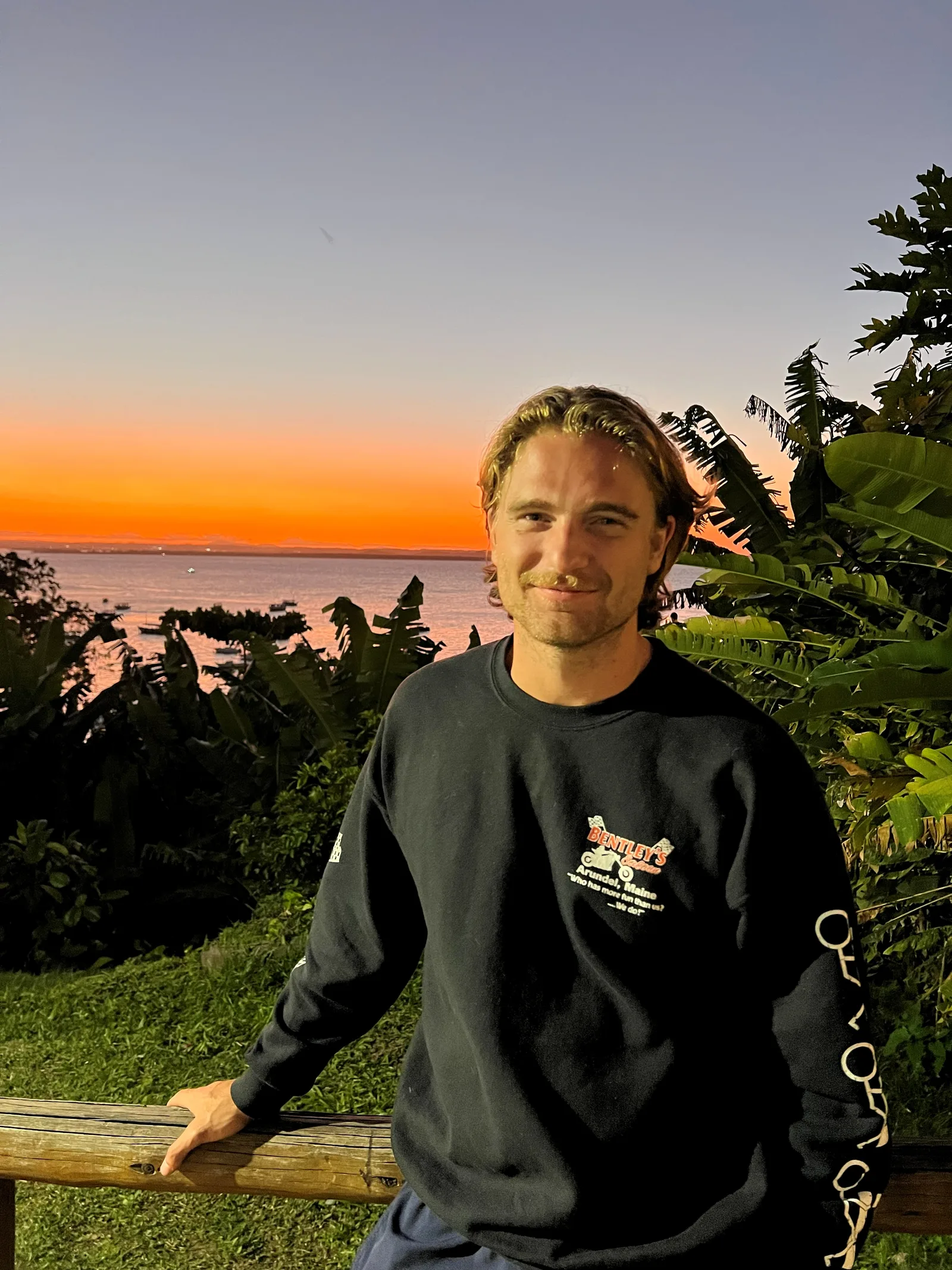 Logan at sunset over the bay in Bahia