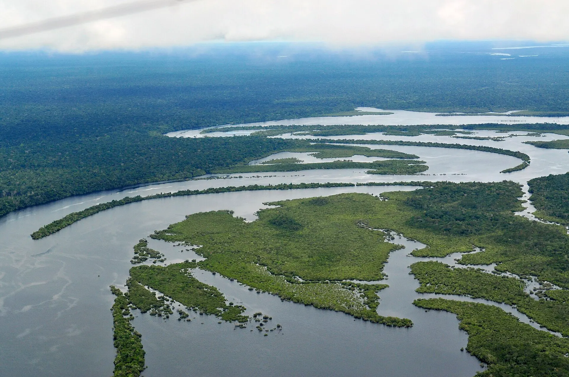The Amazon river winding through unbroken rainforest