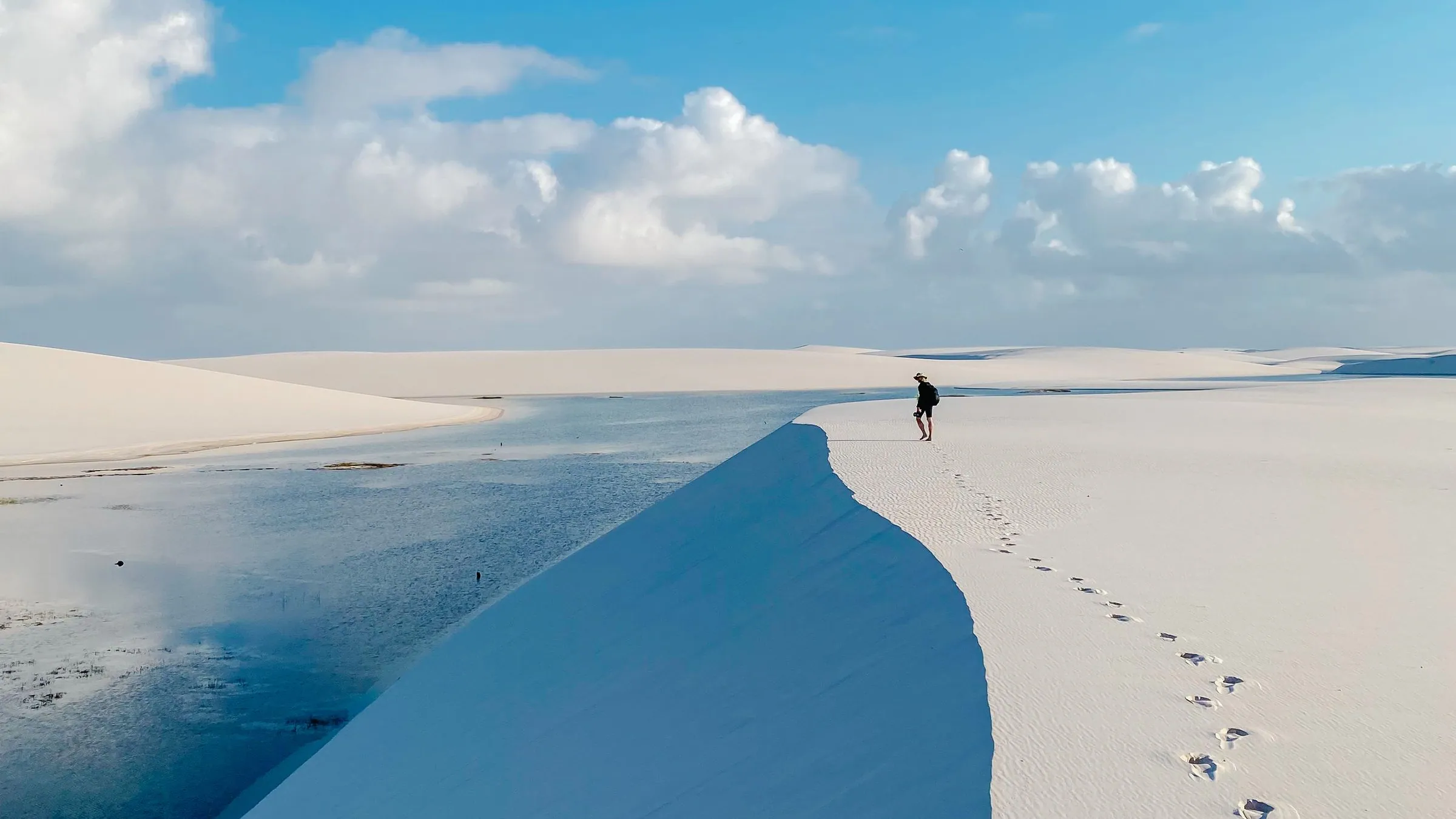 Trekking across the dunes of the Lençóis Maranhenses