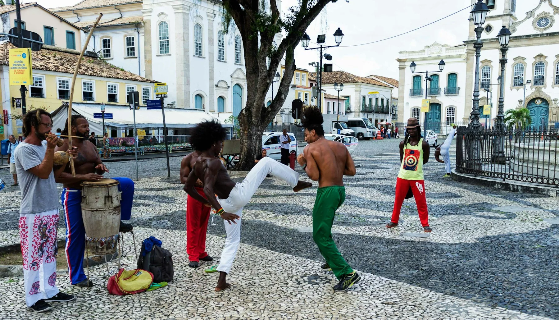 A capoeira roda by firelight in Bahia