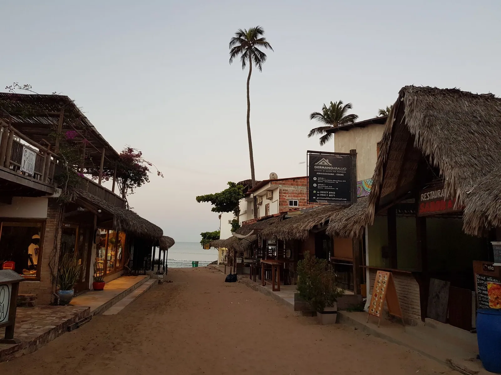 The sand streets of Jericoacoara village at dusk