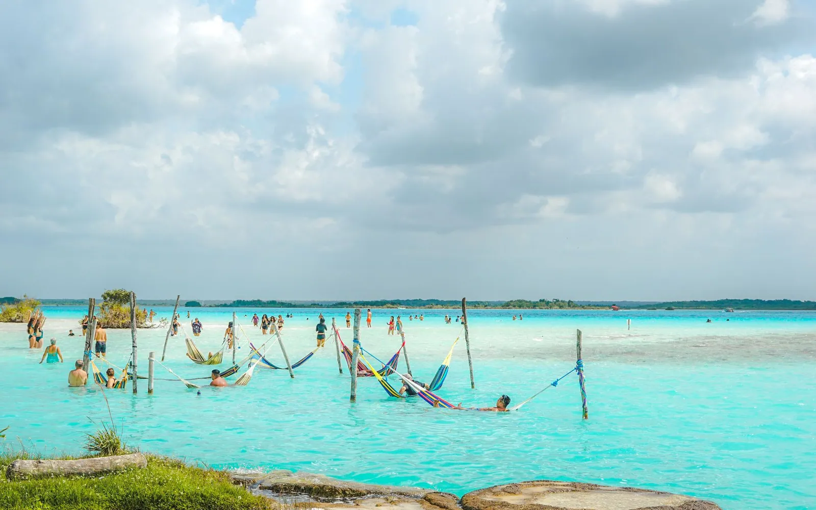 Hammocks set in the shallows of Lagoa do Paraíso near Jericoacoara