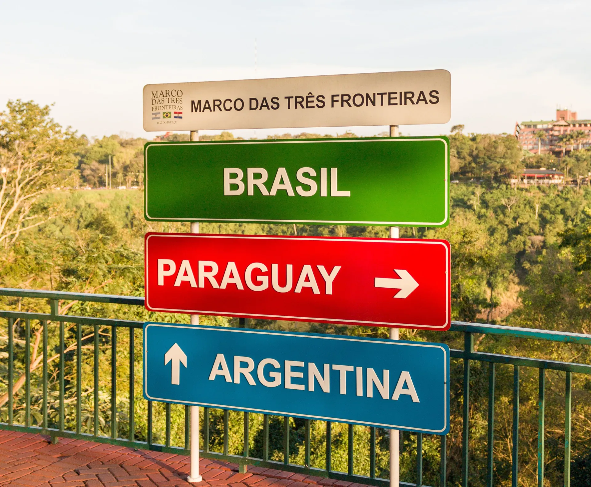 The three-borders landmark at Foz do Iguaçu at sunset