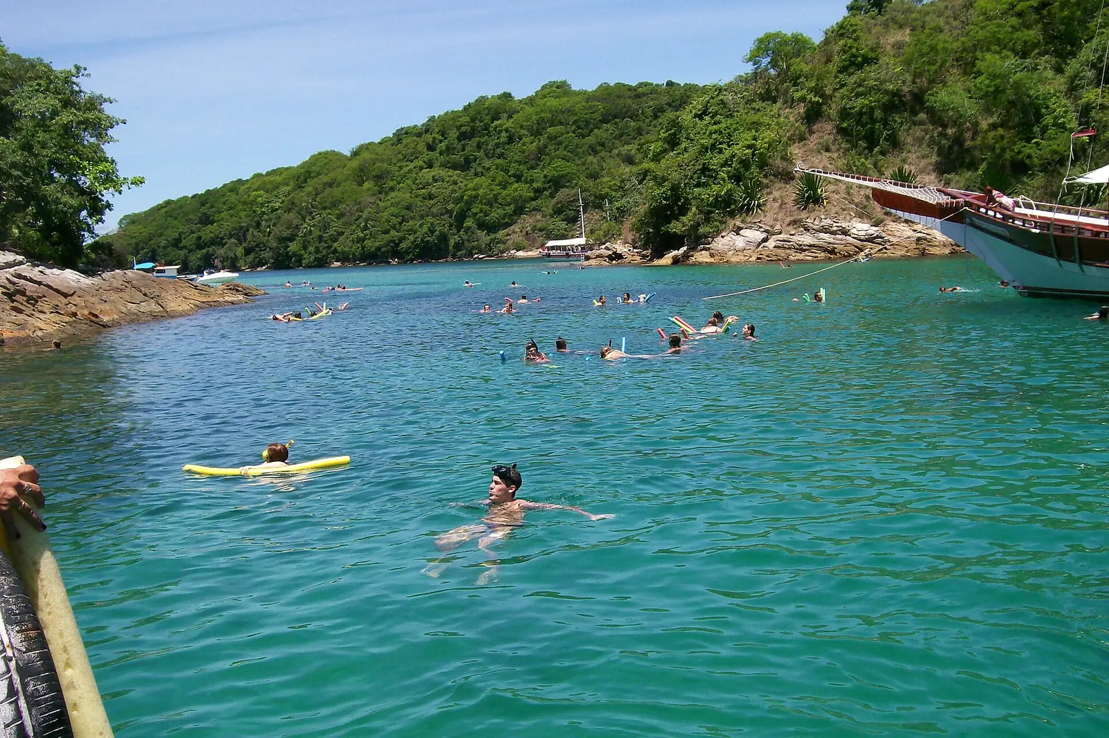 Snorkellers in the clear water of Lagoa Azul, Ilha Grande